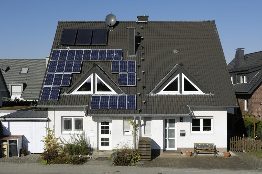 Semi- detached houses with solar panels on the roof